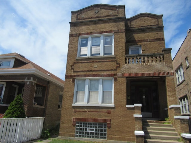 5822 S Sacramento Ave, Chicago, IL 60629 - townhome / multi-family property featuring brick siding and a balcony