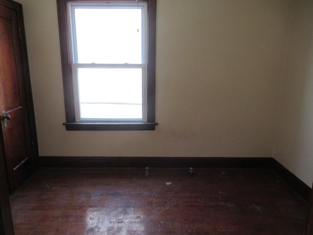 5822 S Sacramento Ave, Chicago, IL 60629 - spare room with wood finished floors and baseboards
