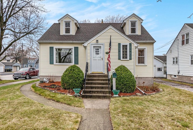 17958 Escanaba Ave, Lansing, IL 60438 - cape cod-style house featuring a front yard and a shingled roof