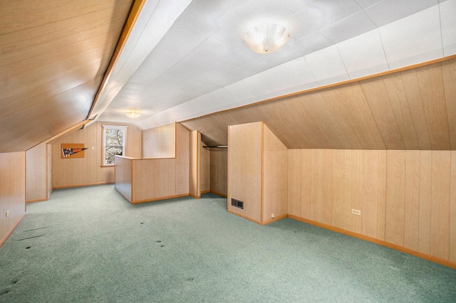 17958 Escanaba Ave, Lansing, IL 60438 - additional living space with carpet floors, vaulted ceiling, and wooden walls