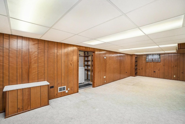 17958 Escanaba Ave, Lansing, IL 60438 - finished below grade area with a drop ceiling, carpet flooring, and wood walls