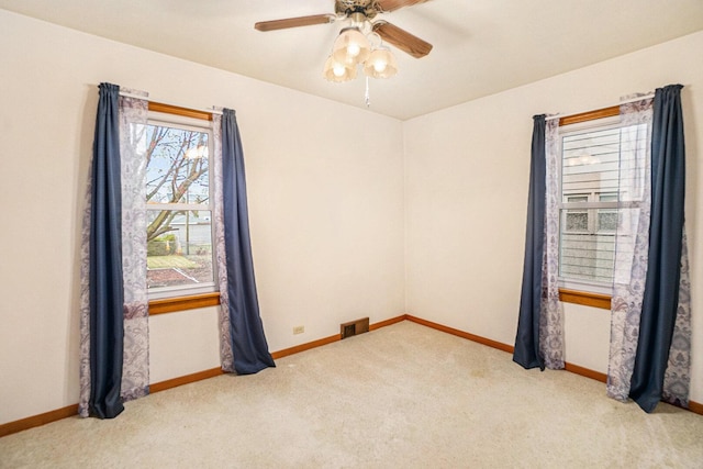 17958 Escanaba Ave, Lansing, IL 60438 - carpeted spare room featuring baseboards and ceiling fan