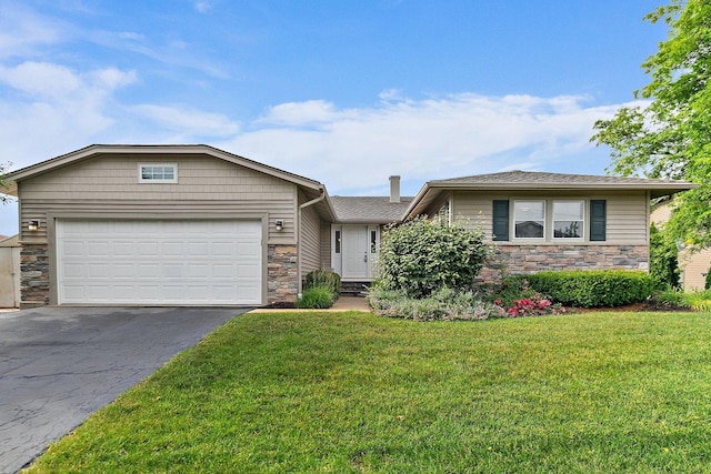 1642 Iowa Dr, Elk Grove Village, IL 60007 - view of front facade featuring stone siding, asphalt driveway, a front yard, an attached garage, and a chimney