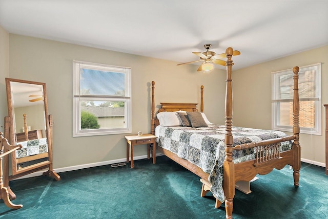 1642 Iowa Dr, Elk Grove Village, IL 60007 - bedroom with multiple windows, dark carpet, and a ceiling fan