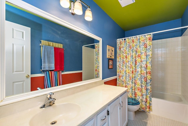 1642 Iowa Dr, Elk Grove Village, IL 60007 - bathroom with vanity, shower / bath combo with shower curtain, and tile patterned floors