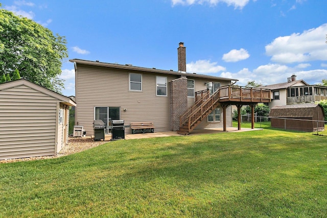 1642 Iowa Dr, Elk Grove Village, IL 60007 - back of property featuring a storage unit, a patio area, a chimney, a deck, and stairway