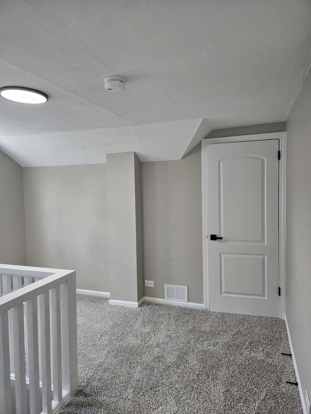 540 47th Ave, Bellwood, IL 60104 - basement featuring carpet and a textured ceiling