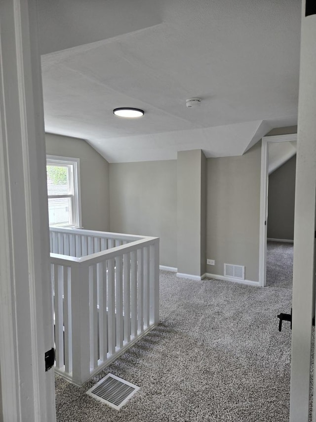 540 47th Ave, Bellwood, IL 60104 - hallway with vaulted ceiling and carpet floors