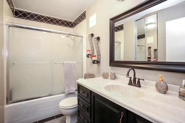 1415 E Central Rd Unit 219C, Arlington Heights, IL 60005 - bathroom featuring vanity and bath / shower combo with glass door