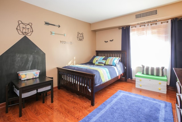 1415 E Central Rd Unit 219C, Arlington Heights, IL 60005 - bedroom with wood finished floors