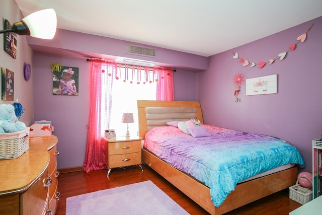 1415 E Central Rd Unit 219C, Arlington Heights, IL 60005 - bedroom featuring dark wood-style floors and baseboards