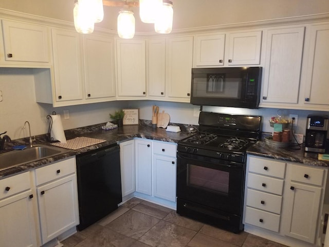 711 S 3rd St, Oregon, IL 61061 - kitchen featuring black appliances, white cabinets, and decorative light fixtures