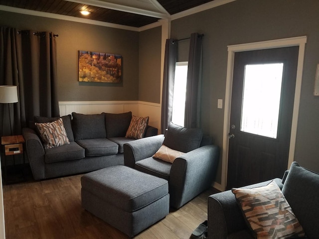 711 S 3rd St, Oregon, IL 61061 - living room with wood ceiling, wood finished floors, wainscoting, and ornamental molding
