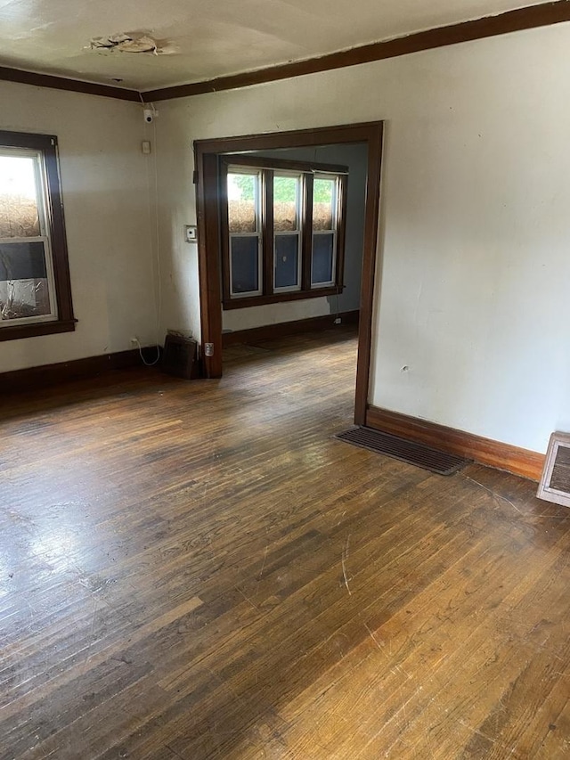 945 E Hickory St, Kankakee, IL 60901 - unfurnished room with crown molding and wood-type flooring