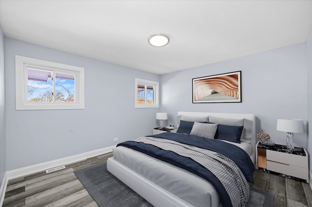 19400 Oak Ave Unit 1, Country Club Hills, IL 60478 - bedroom with multiple windows and wood finished floors