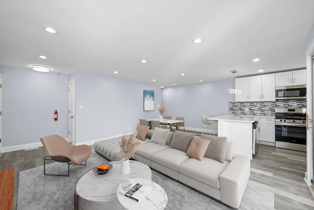 19400 Oak Ave Unit 1, Country Club Hills, IL 60478 - living area featuring recessed lighting and light wood-type flooring