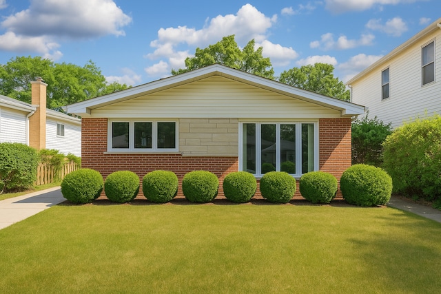 5008 Culver St, Skokie, IL 60077 - view of front of house featuring brick siding and a front lawn