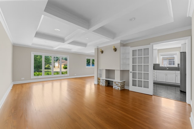 5008 Culver St, Skokie, IL 60077 - unfurnished living room featuring healthy amount of natural light, beam ceiling, wood finished floors, crown molding, and coffered ceiling