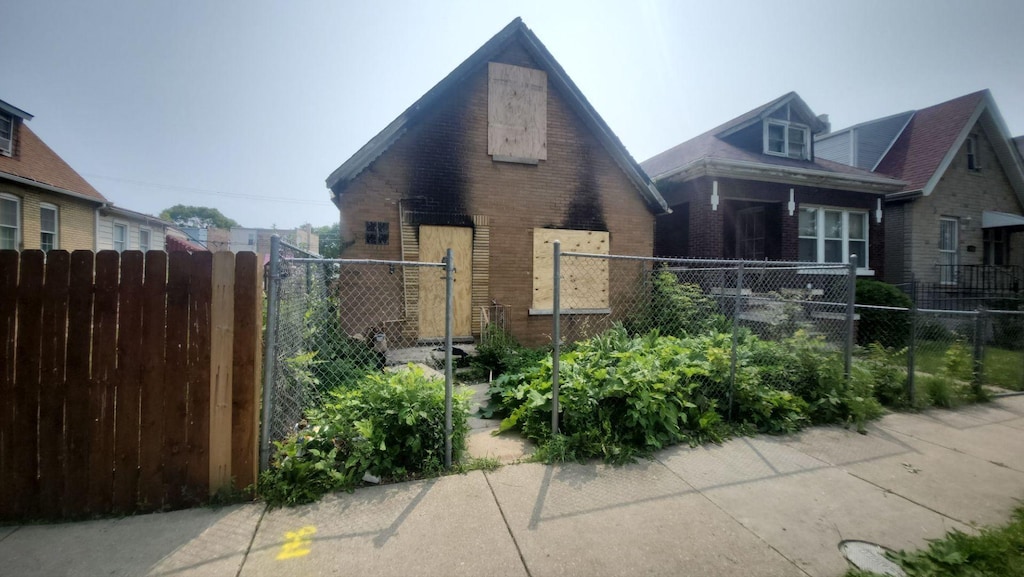 1017 N Avers Ave, Chicago, IL 60651 - view of front facade with brick siding