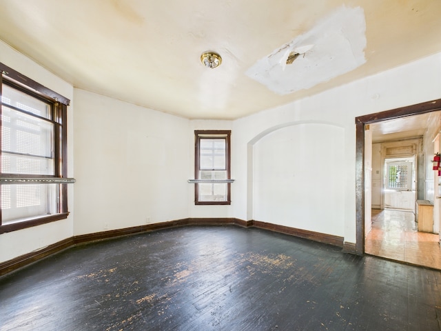 5045 W Erie St, Chicago, IL 60644 - spare room featuring wood-type flooring