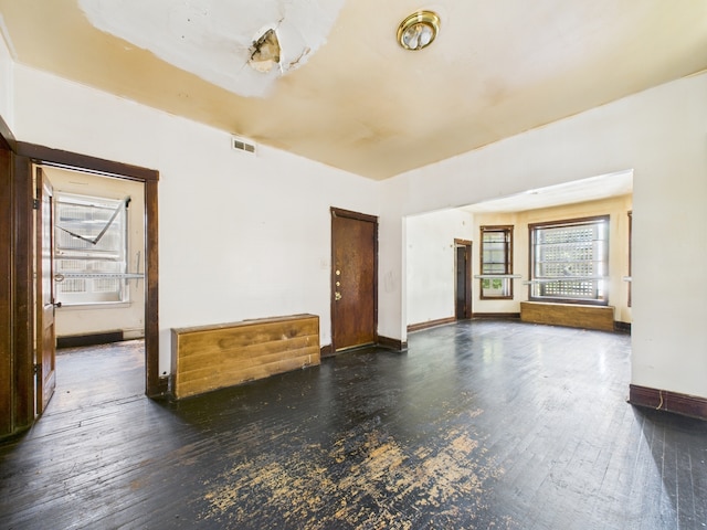 5045 W Erie St, Chicago, IL 60644 - spare room featuring hardwood / wood-style flooring and baseboards