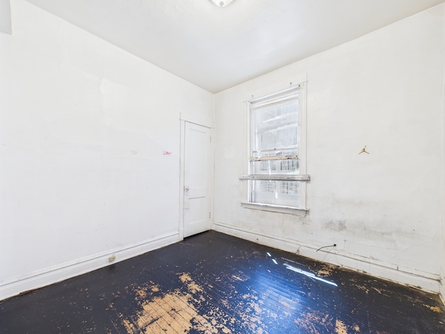 5045 W Erie St, Chicago, IL 60644 - unfurnished room featuring wood-type flooring