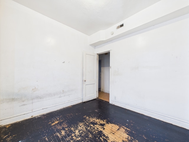 5045 W Erie St, Chicago, IL 60644 - empty room featuring hardwood / wood-style floors and baseboards