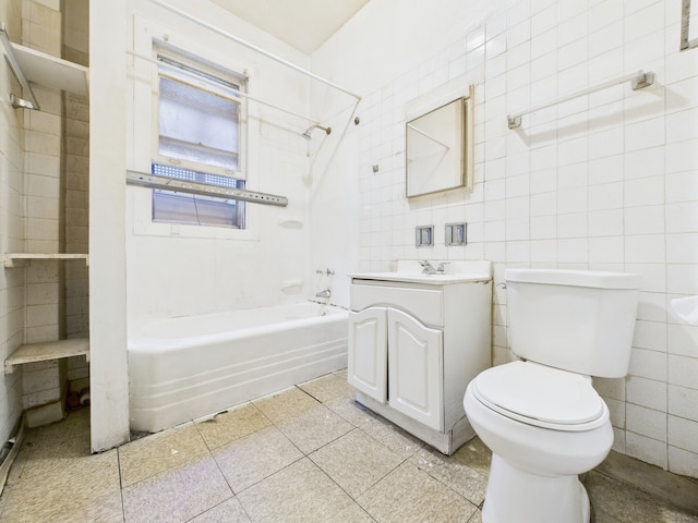 5045 W Erie St, Chicago, IL 60644 - full bath with tile walls, bathtub / shower combination, and vanity