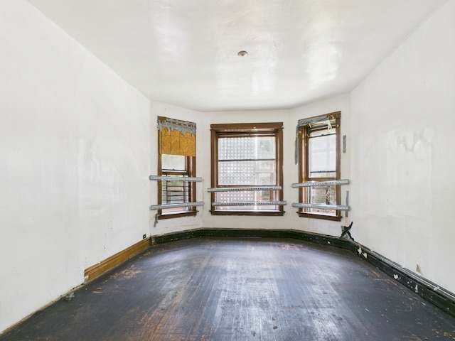 5045 W Erie St, Chicago, IL 60644 - unfurnished room with wood finished floors and baseboards