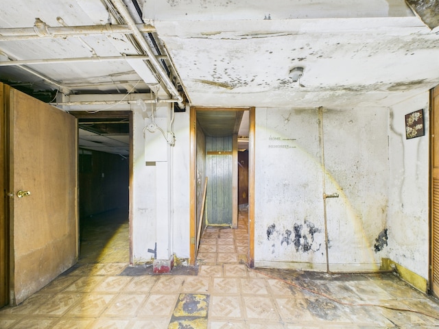 5045 W Erie St, Chicago, IL 60644 - unfinished below grade area featuring light flooring