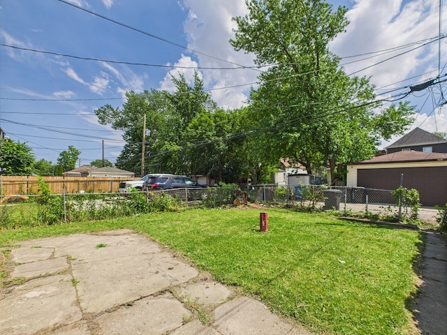 5045 W Erie St, Chicago, IL 60644 - view of yard featuring a detached garage