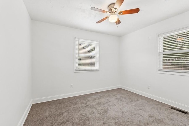 7825 Susan St, Morris, IL 60450 - empty room featuring carpet floors and a ceiling fan