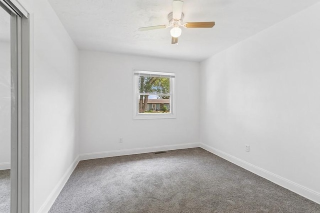 7825 Susan St, Morris, IL 60450 - carpeted spare room with a ceiling fan and baseboards