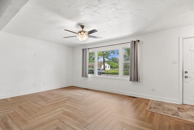 7825 Susan St, Morris, IL 60450 - spare room featuring baseboards and a ceiling fan