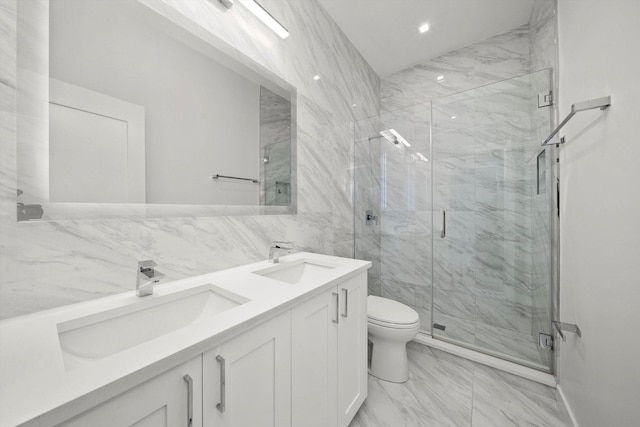 702 W Wellington Ave Unit 2N, Chicago, IL 60657 - bathroom with tile walls, marble finish flooring, a marble finish shower, and double vanity