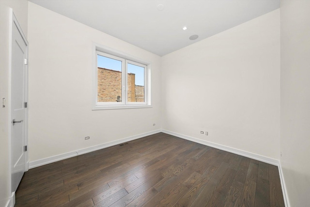 702 W Wellington Ave Unit 2N, Chicago, IL 60657 - empty room with dark wood finished floors and lofted ceiling