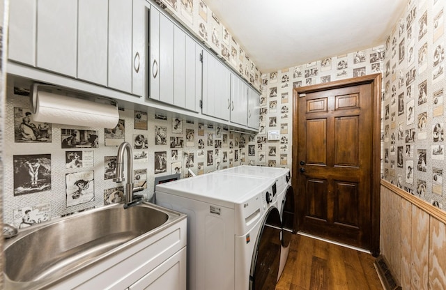 2527 Checker Rd, Long Grove, IL 60047 - washroom with wallpapered walls, dark wood finished floors, cabinet space, washer and dryer, and a wainscoted wall