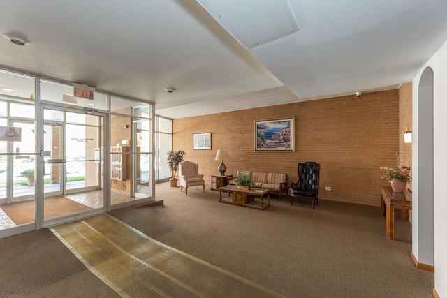 1633 River St Unit 2B, Des Plaines, IL 60016 - community lobby with expansive windows and brick wall