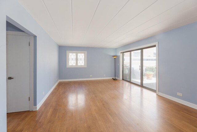 1633 River St Unit 2B, Des Plaines, IL 60016 - unfurnished room featuring wood finished floors and baseboards