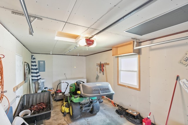 1807 21st Ave, Sterling, IL 61081 - garage with a garage door opener and electric panel