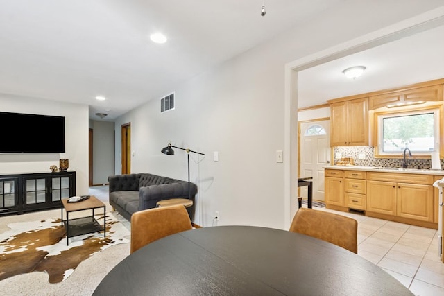 1807 21st Ave, Sterling, IL 61081 - dining area featuring light tile patterned floors and recessed lighting