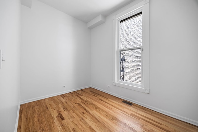 3722 S Wabash Ave, Chicago, IL 60653 - empty room featuring light wood-style flooring and plenty of natural light