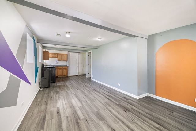 3722 S Wabash Ave, Chicago, IL 60653 - unfurnished living room featuring light wood finished floors and baseboards