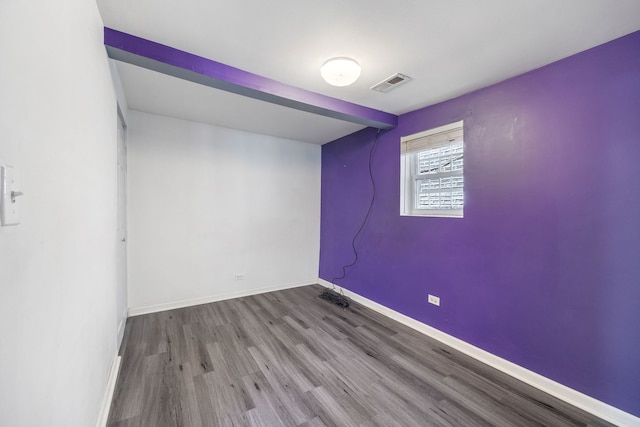3722 S Wabash Ave, Chicago, IL 60653 - empty room featuring wood finished floors and baseboards