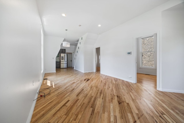 3722 S Wabash Ave, Chicago, IL 60653 - unfurnished living room featuring light wood-type flooring and recessed lighting