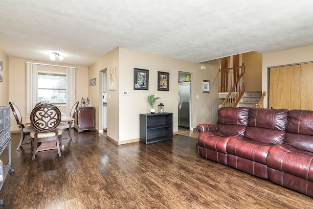 7936 N Ramsgate Cir, Hanover Park, IL 60133 - living area featuring wood finished floors, stairs, and a textured ceiling