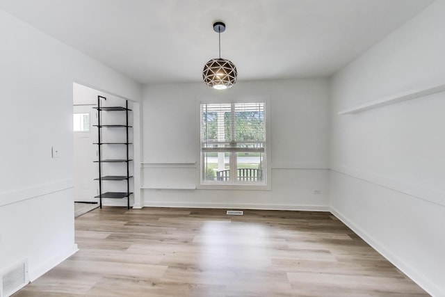 1329 Neskola Ct, Naperville, IL 60564 - unfurnished dining area featuring wood finished floors