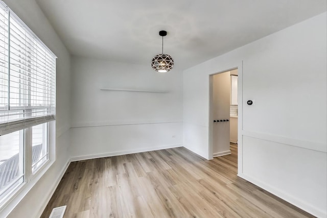 1329 Neskola Ct, Naperville, IL 60564 - unfurnished room with light wood-style floors