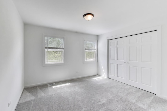 1329 Neskola Ct, Naperville, IL 60564 - unfurnished bedroom featuring carpet floors and a closet