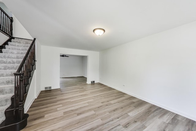 1329 Neskola Ct, Naperville, IL 60564 - unfurnished room with stairway and wood finished floors